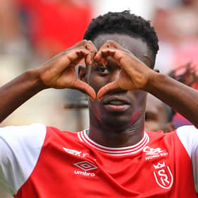 Reims’ English forward Folarin Balogun celebrates  after scoring a penalty kick  during the French L1 football match (Photo by FRANCOIS LO PRESTI/AFP via Getty Images)