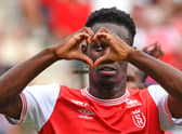 Reims’ English forward Folarin Balogun celebrates  after scoring a penalty kick  during the French L1 football match (Photo by FRANCOIS LO PRESTI/AFP via Getty Images)