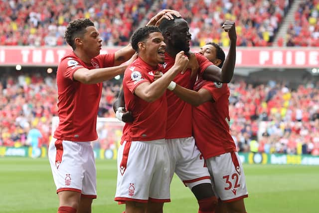 Cheikhou Kouyate of Nottingham Forest celebrates with team mates after scoring their team's first goal during the Premier League match between Nottingham Forest and AFC Bournemouth