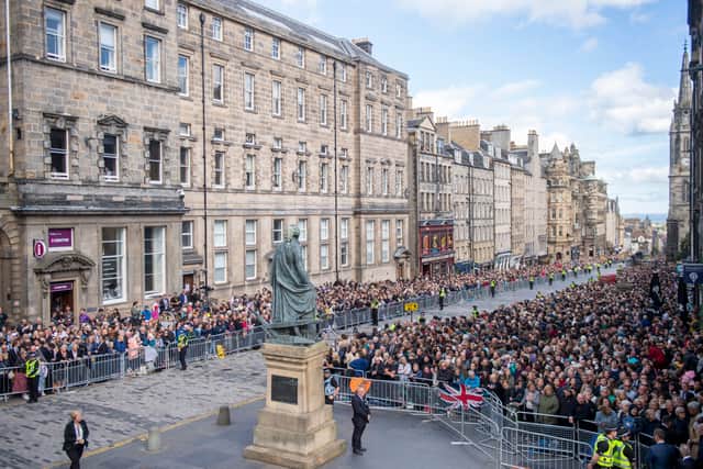 Crowds gather to watch the procession of Queen Elizabeth II’s coffin from the Palace of Holyroodhouse to St Giles’ Cathedral. Photo: Getty