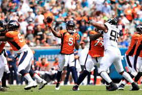 Teddy Bridgewater #5 of the Denver Broncos attempts a pass during the game against the Jacksonville Jaguars 