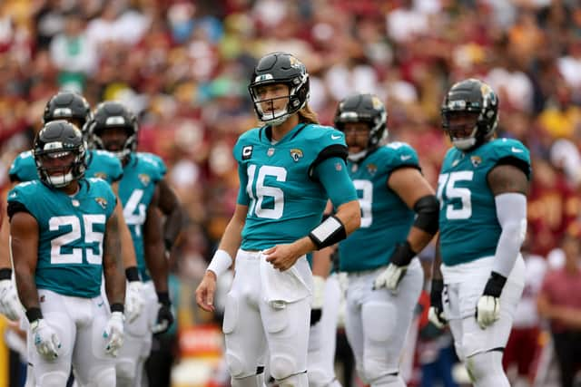 Quarterback Trevor Lawrence #16 of the Jacksonville Jaguars looks on against the Washington Commanders