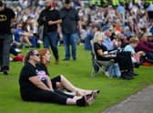 Mourners gather to watch the procession for the lying-in-state of Queen Elizabeth II at the Hyde Park screening site. Photo: Getty