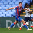 Kofi Balmer of Crystal Palace and Romaine Mundle of Tottenham battle for the ball during the Premier League 2 match between Crystal Palace and Tottenham Hotspur  at Selhurst Park on September 03, 2022 in London, England. (Photo by Andrew Redington/Getty Images)