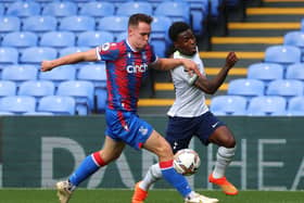 Kofi Balmer of Crystal Palace and Romaine Mundle of Tottenham battle for the ball during the Premier League 2 match between Crystal Palace and Tottenham Hotspur  at Selhurst Park on September 03, 2022 in London, England. (Photo by Andrew Redington/Getty Images)