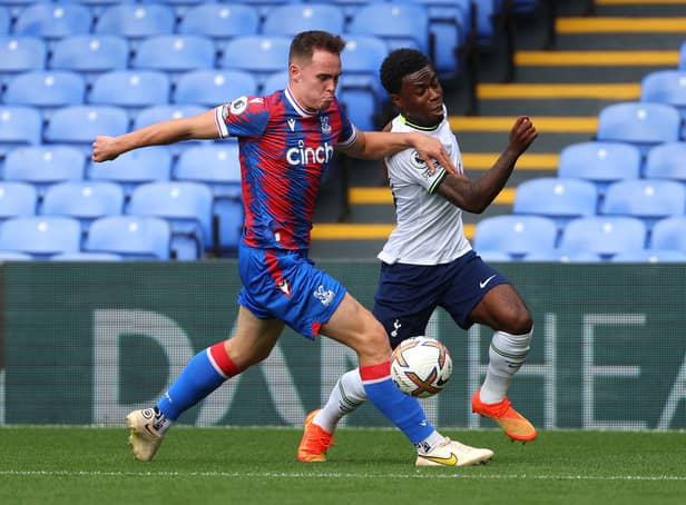 <p>Kofi Balmer of Crystal Palace and Romaine Mundle of Tottenham battle for the ball during the Premier League 2 match between Crystal Palace and Tottenham Hotspur  at Selhurst Park on September 03, 2022 in London, England. (Photo by Andrew Redington/Getty Images)</p>