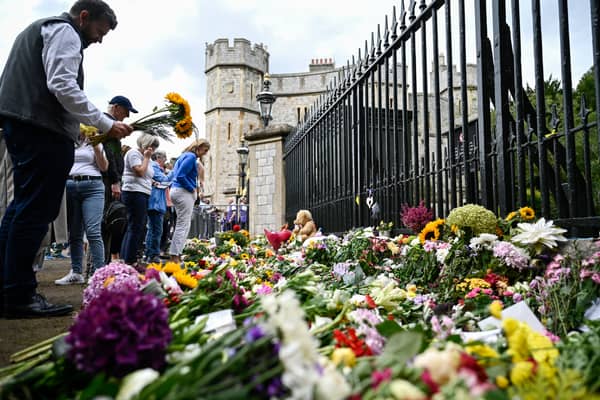 Flowers laid at the Queen’s home at Windsor Castle. Photo: Getty