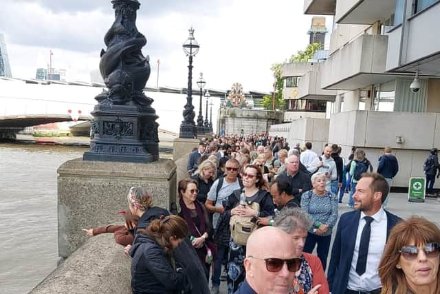 The queue stretching along the south bank. Photo: Rahman Osman