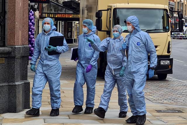 Forensics at the scene off Rupert Street in London. Photo: SWNS