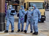 Forensics at the scene off Rupert Street in London. Photo: SWNS