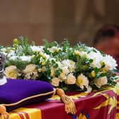 The coffin of Queen Elizabeth II, adorned with a Royal Standard and the Imperial State Crown. Photo: Getty
