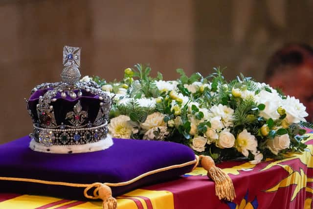 The coffin of Queen Elizabeth II, adorned with a Royal Standard and the Imperial State Crown. Photo: Getty
