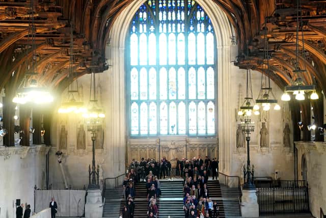 Members of the public file past the coffin of Queen Elizabeth II. Photo: Getty