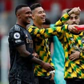 Arsenal players celebrate win over Brentford.  