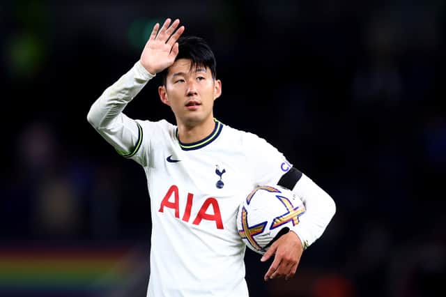  Son Heung-Min of Tottenham Hotspur celebrates victory with their hat-trick match ball  (Photo by Clive Rose/Getty Images)