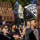 Demonstrators gather outside New Scotland Yard in London during a protest over the shooting of Chris Kaba. Photo: Getty