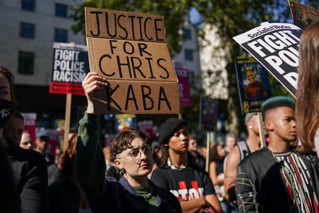 Demonstrators gather outside New Scotland Yard in London during a protest over the killing of Chris Kaba. Photo: Getty