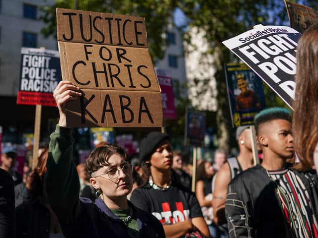Demonstrators gather outside New Scotland Yard in London during a protest over the shooting of Chris Kaba. Photo: Getty