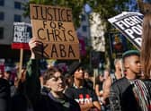 Demonstrators gather outside New Scotland Yard in London during a protest over the shooting of Chris Kaba. Photo: Getty