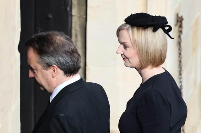 Prime Minister Liz Truss (R) and her husband, Hugh O’Leary. Photo: Getty