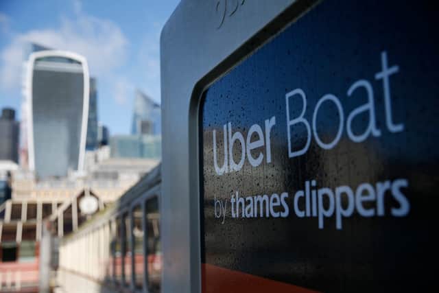 The Uber Boat logo in view of the City of London skyline. Photo: Getty