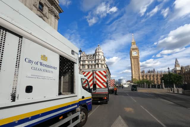 Over 150 workers and 19 vehicles were sent to clear litter and remove sand from the roads on Tuesday. Credit: Westminster Council
