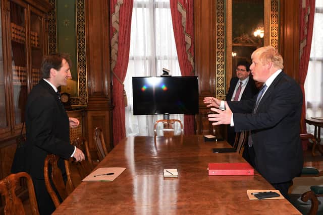 Foreign secretary Boris Johnson (R) meets with Richard Ratcliffe. Photo: Getty