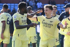 Thomas Partey and Kieran Tierney of Arsenal celebrate after the Premier League match  (Photo by Stuart MacFarlane/Arsenal FC via Getty Images)