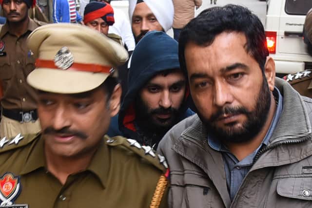 Jagtar Singh Johal (right)