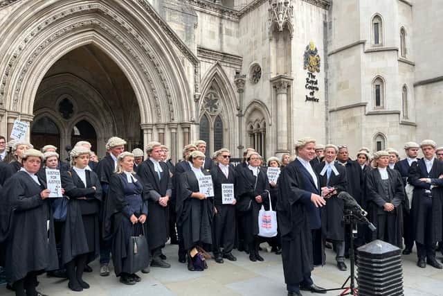 Striking barristers gathered to protest outside the Royal Courts of Justice. Photo: LondonWorld