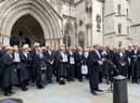Striking barristers gathered to protest outside the Royal Courts of Justice. Photo: LondonWorld