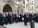 Striking barristers gathered to protest outside the Royal Courts of Justice. Photo: LondonWorld