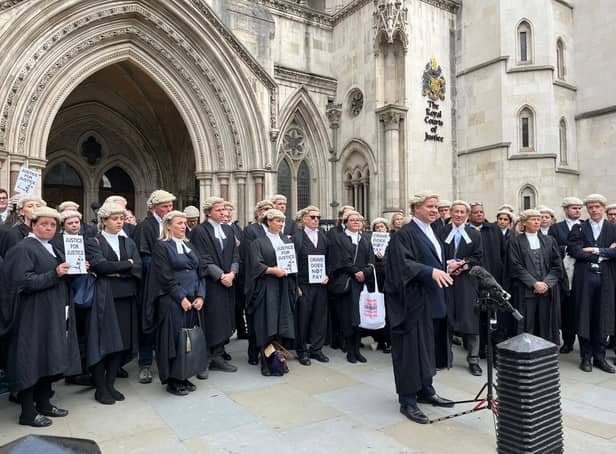 <p>Striking barristers gathered to protest outside the Royal Courts of Justice. Photo: LondonWorld</p>