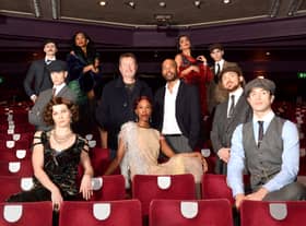 Steven Knight, creator of Peaky Blinders and Benoit Swan Pouffer, choreographer and Rambert artistic director, pose with dancers from Rambert during the press launch of a Rambert Dance production entitled "Peaky Blinders: The Redemption of Thomas Shelby"