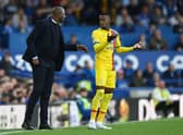 Patrick Vieira, Manager of Crystal Palace interacts with Wilfried Zaha of Crystal Palace. (Photo by Gareth Copley/Getty Images)