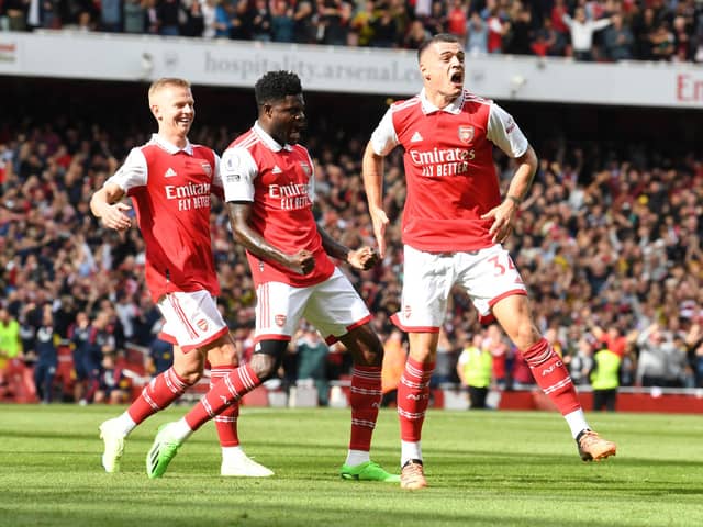 Thomas Partey celebrates scoring a goal for Arsenal with Granit Xhaka and Oleksandr Zinchenko (Photo by David Price/Arsenal FC via Getty Images)