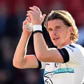 Chelsea’s English midfielder Conor Gallagher applauds the fans following the English Premier League football match  (Photo by GLYN KIRK/AFP via Getty Images)