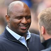 Crystal Palace’s French manager Patrick Vieira (L) greets Chelsea’s English head coach Graham Potter before the English Premier League (Photo by GLYN KIRK/AFP via Getty Images)