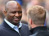 Crystal Palace’s French manager Patrick Vieira (L) greets Chelsea’s English head coach Graham Potter before the English Premier League (Photo by GLYN KIRK/AFP via Getty Images)