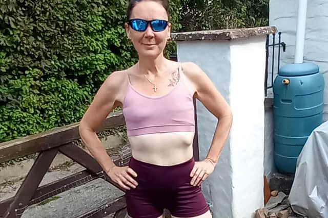 Louise has not let her treatment stop her from running - and is taking part in the London Marathon virtually. Photo: Louise Butcher/ SWNS