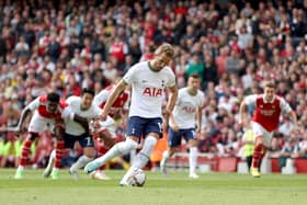  Harry Kane of Tottenham Hotspur scores their sides first goal from the penalty spot during the Premier League match (Photo by Catherine Ivill/Getty Images)