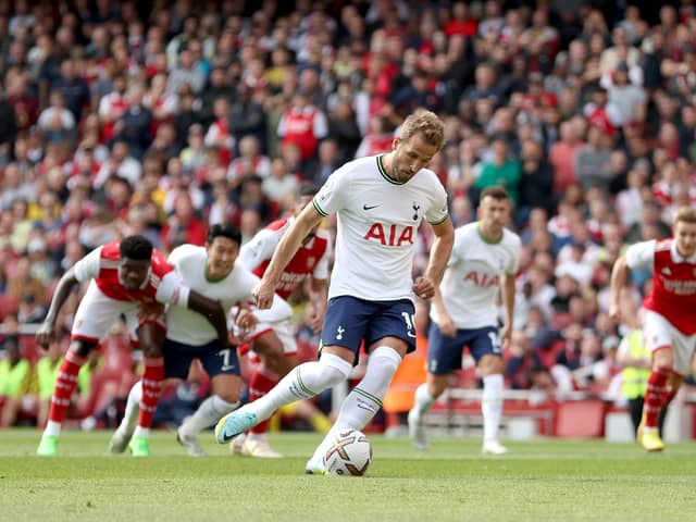  Harry Kane of Tottenham Hotspur scores their sides first goal from the penalty spot during the Premier League match (Photo by Catherine Ivill/Getty Images)