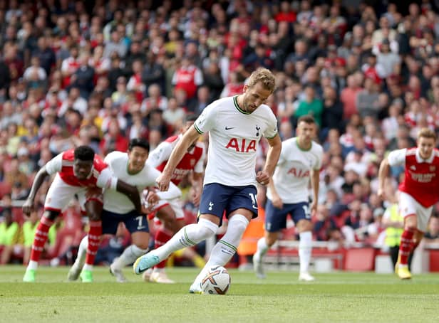 <p> Harry Kane of Tottenham Hotspur scores their sides first goal from the penalty spot during the Premier League match (Photo by Catherine Ivill/Getty Images)</p>
