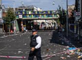 A police officer at the scene of a fatal stabbing during the Notting Hill Carnival. Photo: Getty
