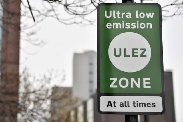 New signs for the ultra-low emission zone (ULEZ) are pictured in central London. Photo: Getty