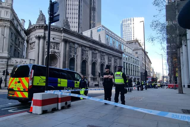 Paramedics and police officers rushed to Bishopsgate near Liverpool Street Station. Photo: LondonWorld