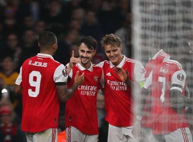 Arsenal’s Portuguese midfielder Fabio Vieira (2nd L) celebrates with teammates after scoring his team third goal during the UEFA Europa. (Photo by DANIEL LEAL/AFP via Getty Images)