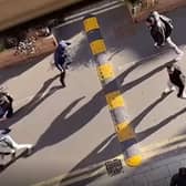 Armed police intervened after a street fight in London - which saw a group attacking each other ‘with weapons’. Photo: SWNS