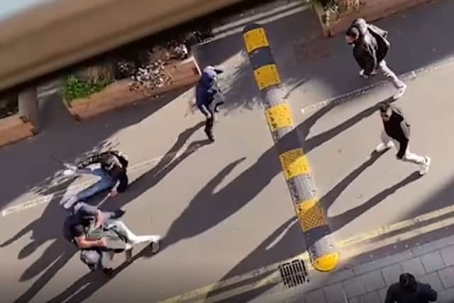 Armed police intervened after a street fight in London - which saw a group attacking each other ‘with weapons’. Photo: SWNS