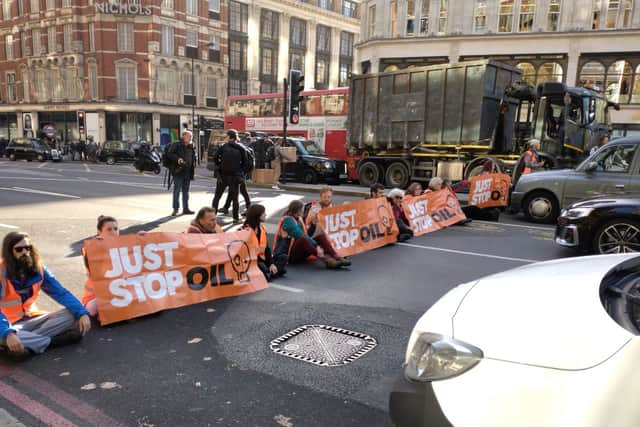 Just Stop oil protestors have blocked roads in Knightsbridge. Credit: Just Stop Oil